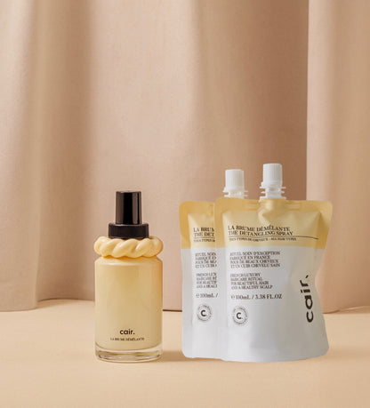 Our detangling mist and its two refills