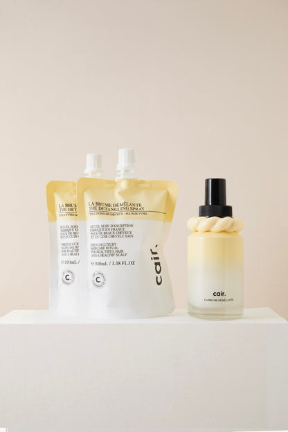 Our detangling mist and its two refills